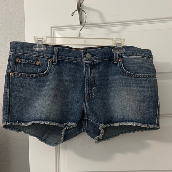 Levi's Pants - Levi’s cut off shorts medium rinse denim jean SZ 32 or 14 100% cotton distressed